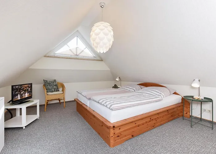 Haus Strandlooper Апартаменты Нойхарлингерзиль