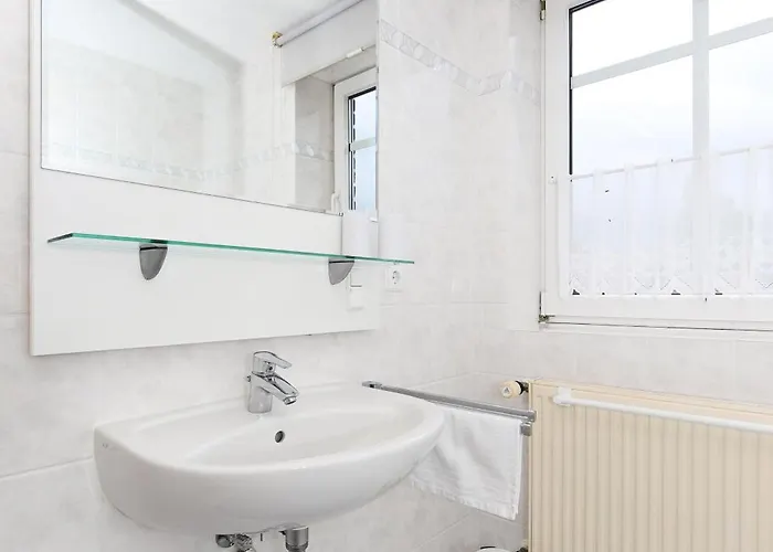 Апартаменты Haus Strandlooper Нойхарлингерзиль