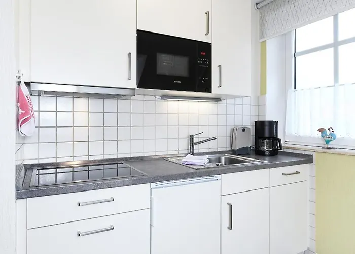 Апартаменты Haus Strandlooper Нойхарлингерзиль