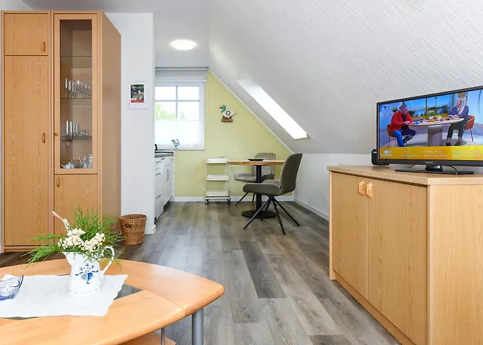 Апартаменты Haus Strandlooper Нойхарлингерзиль