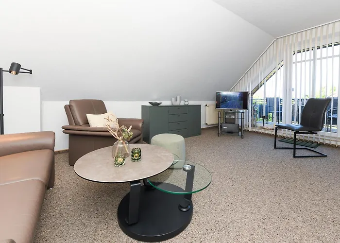 Haus Strandlooper Апартаменты Нойхарлингерзиль