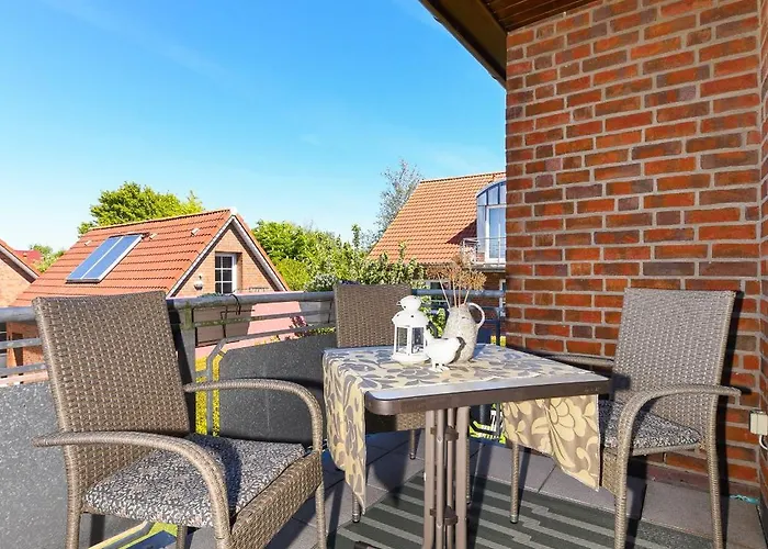 Апартаменты Haus Strandlooper Нойхарлингерзиль